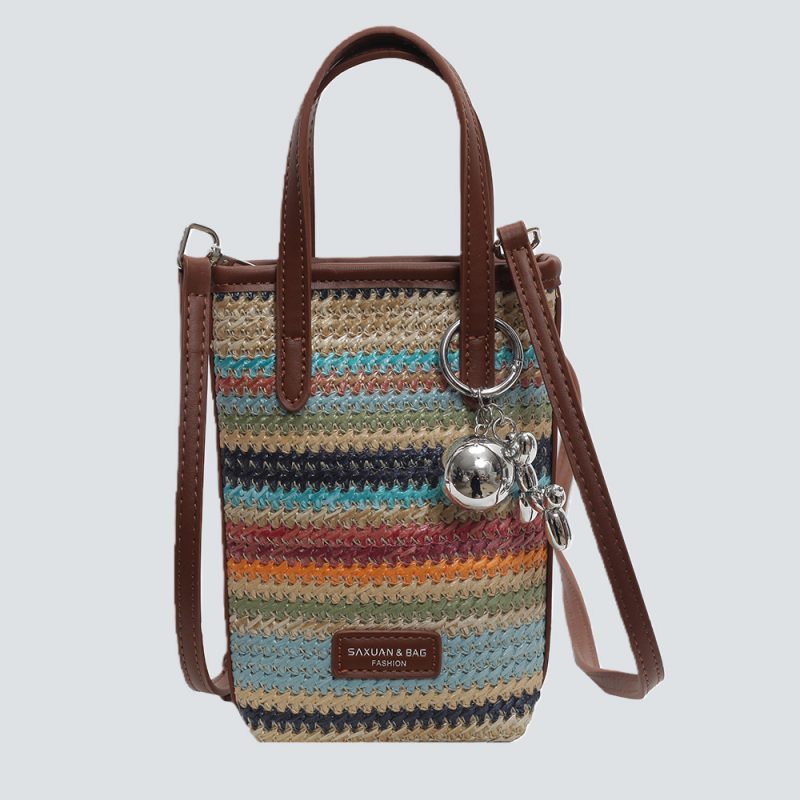 Vintage-Inspired Leather Barrel Bag with Tassel Detail